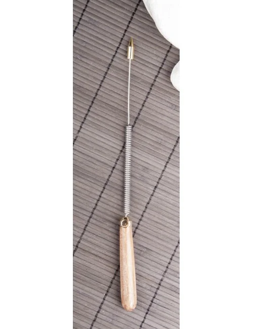 Tensor mit braunem Holzgriff