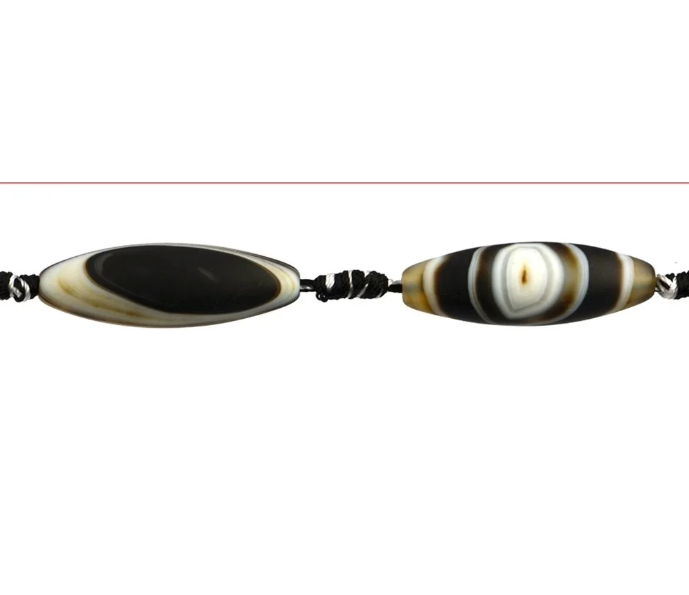 Heilstein & Edelstein-Strang - Spindel, Onyx gebändert (gef.) matt, 40 x 14 mm